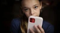 Australia enforces a groundbreaking social media ban for children, sparking conversations about its viability and unintended consequences as young users find ways around restrictions.