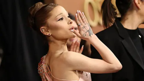 Public Outrage in Singapore Following Incident Involving Ariana Grande