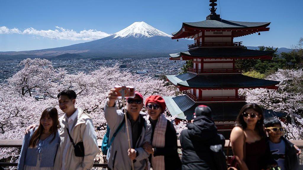 Uphill Climb: Japan’s New Residency Fees Resonate With Indigenous Communities
