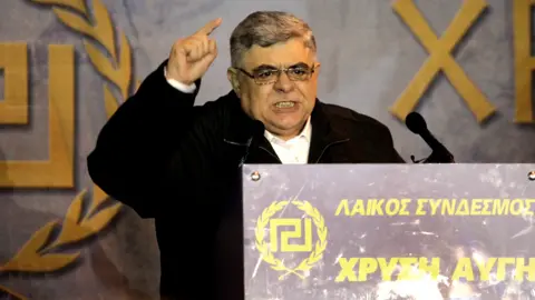 Greek Neo-Nazi Leader Nikos Michaloliakos Released from Prison Early, Sparking Outrage