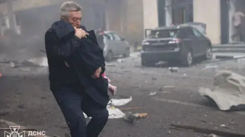 Bravery Amidst Chaos: Ukrainian Rescuers Save 48 Children from Drone Attack