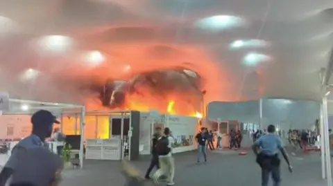 Evacuation at COP30: Fire Disrupts Climate Talks in Brazil