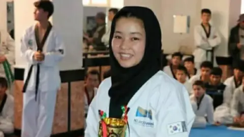 Freedom for Afghan Female Athlete: Khadija Ahmadzada Released from Taliban Custody