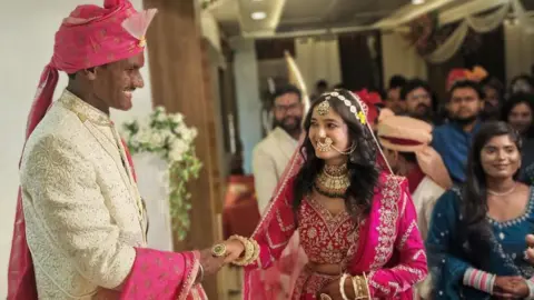 Couple Faces Trolls Over Skin Color After Viral Wedding Video